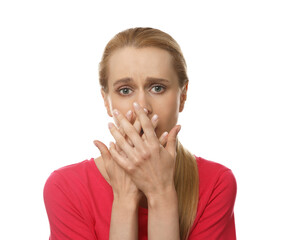 Young woman feeling fear on white background