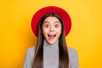 Portrait of attractive cheerful amazed long-haired girl great news reaction isolated over bright...