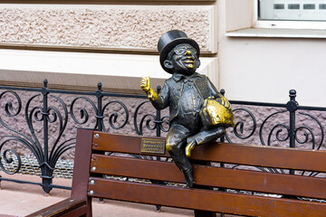 Odessa, Ukraine- March 1, 2021. A bench with a figurine of a fairy tale character.