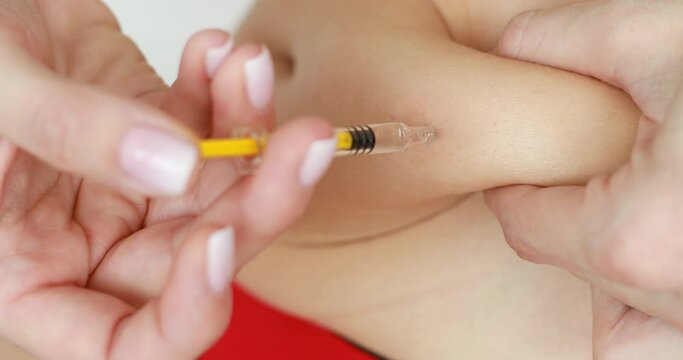 Close up 4k video of abdominal insulin, Hormone, Anticoagulant, injection in stomach