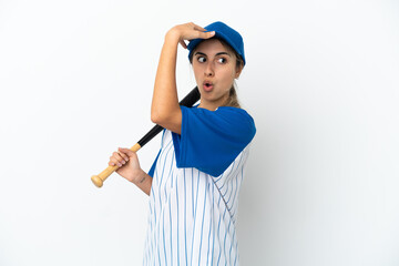 Young caucasian woman playing baseball isolated on white background doing surprise gesture while looking to the side