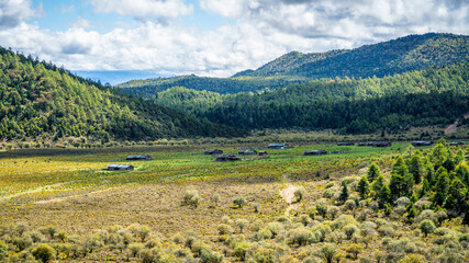 Blue Moon Valley view with pasture and Yak ranch Shangri-La Yunnan China