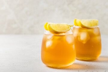 Lemon iced tea in glasses. Space for text.