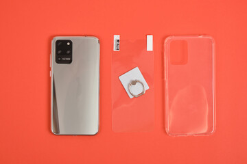 modern smartphone with 3 cameras with metal body, protective glass, ring holder and transparent...