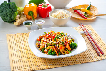 sweet and sour chicken with rice and vegetables