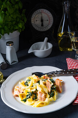 Tagliatelle with salmon and spinach in a cream sauce
