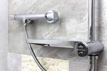 Shower mixer. Detail of shower mixer faucet.