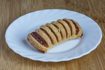 Tasty cookies with apple jam closeup.