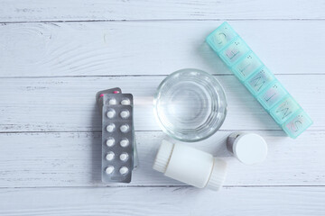 top view of medical blister pack, container on table 