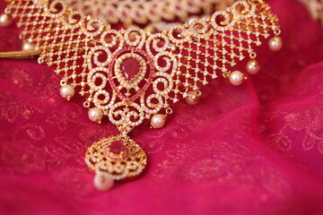 red and gold necklace