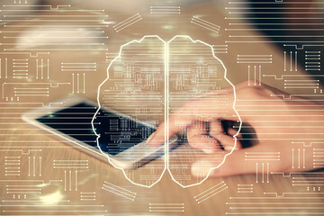 Double exposure of brain sketch hologram and woman holding and using a mobile device.