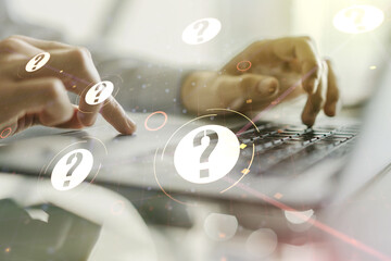 Creative abstract question mark sketch and hands typing on computer keyboard on background, FAQ and...