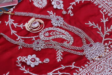 diamond fashion accessories like chain, earring and brooch