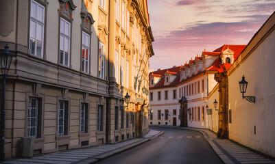 Deserted road at vintage street among old houses in old town Prague, Czech Republic.