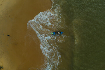 Fototapeta na wymiar Fotografia aérea da Praia da Concha na Barra do Jucu em Vila Velha, Espírito Santo, Brasil.