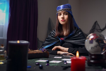 Female fortune teller reading future