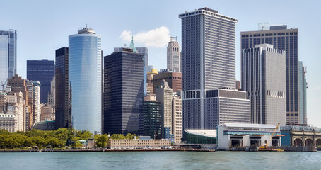 Downtown New York City waterfront on a sunny summer day, USA. - obrazy, fototapety, plakaty