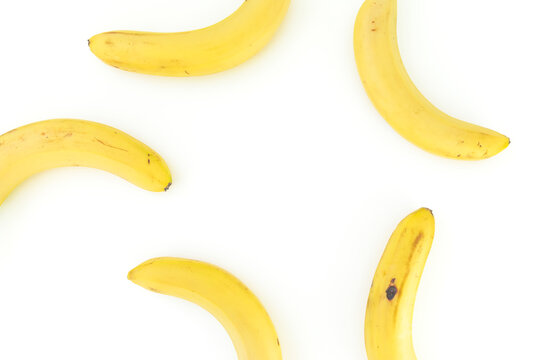 Banana Fruits On White Background. Flat Lay. Top View. Yellow Food Concept With Banana