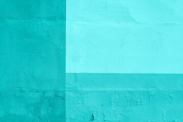 Turquoise painted plaster wall
