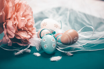 Colorful easter eggs in pastel colors with copy space.