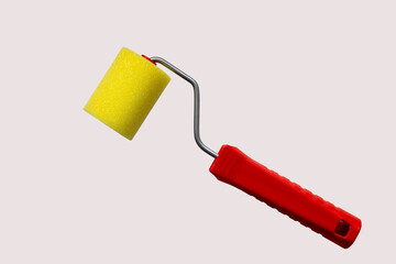yellow foam paint roller and red handle