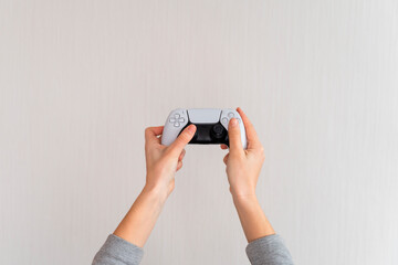Videogame console wireless gamepad. white lifestyle background. Minimal style. Modern leisure at home. 