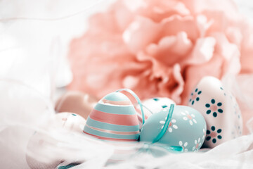 Colorful easter eggs in pastel colors with copy space.