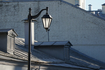 street lighter on the roof with the glare of the sun moscow spring