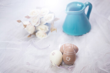 Colorful easter eggs in pastel colors with copy space.