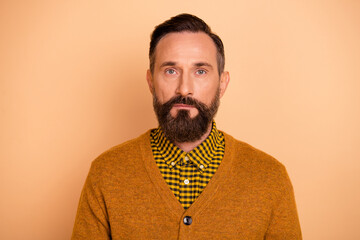 Fototapeta premium Photo of nice person look camera no emotions face wear checkered shirt isolated on beige color background