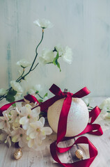 decorated with atlas burgundy ribbon chrismas ball