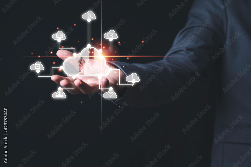 Aufkleber businessman holding virtual cloud computing with connect to technology icons , technology transforma