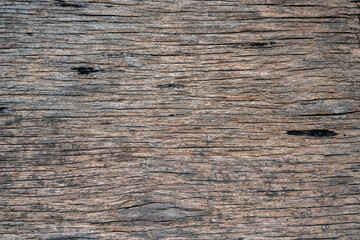 Background, textures and patterns on the plywood under sunlight and rain.