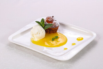 Tasty hot muffin with ice cream