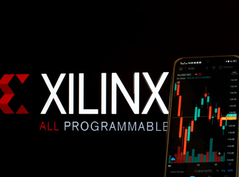 In this photo illustration the stock market information of Xilinx, Inc. seen displayed on a smartphone with the Xilinx, Inc. logo in the background.