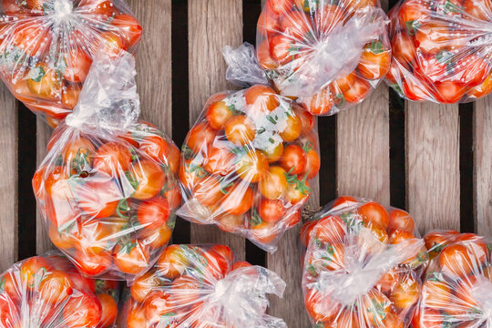 Plastic packed organic cherry tomatoes for sale on a Dutch farm