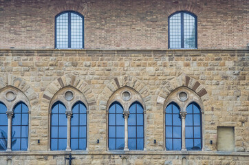 Fototapeta na wymiar ancient doors and windows of medieval historic buildings