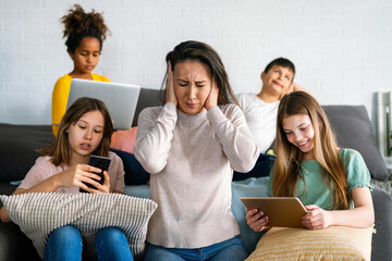 Overworked stressful mother having problems with multiethnic children