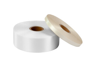 two reels of satin ribbon for tags or needlework in white and beige, isolated on a white background.