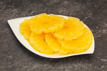 Marinated pineapple rings in the bowl