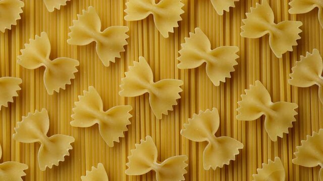 Italian pasta farfalle and spaghetti top view. traditional type of pasta