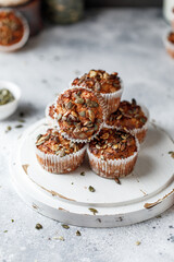 Apple muffins with whole grain flour with pumpkin seeds
