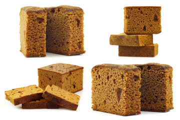 pieces of traditional Dutch dessert cake (ontbijtkoek) on a white background