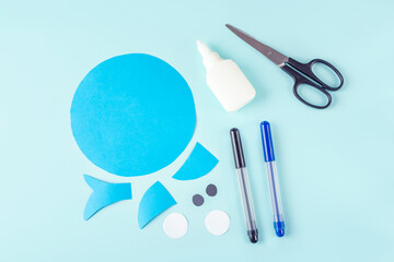 Naklejka premium DIY and kids creativity. Step by step instruction: how to make shark from paper. Step3 Cut out shark details from paper. Children Craft workshop