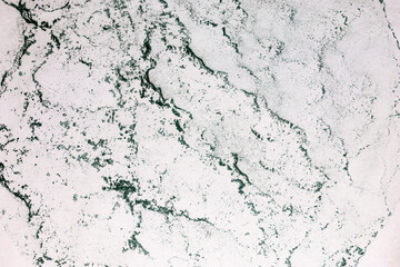 Naklejka premium Abstract background in grey color, hand drawn alcohol painting