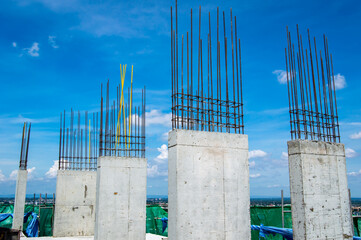 Steel reinforce in concrete column.Steel grid on the construction site.Reinforcement of concrete work. Using steel wire for securing steel bars with wire rod for reinforcement of concrete