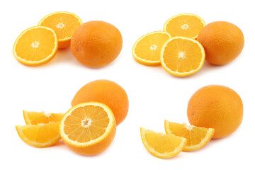 fresh oranges and some cut pieces on a white background