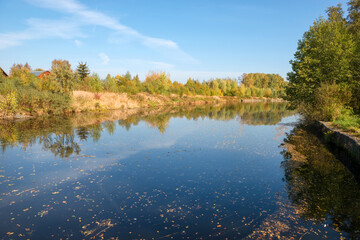 View of the water channel on an autumn sunny day