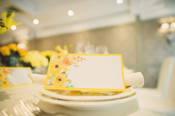 invitation card with yellow flowers