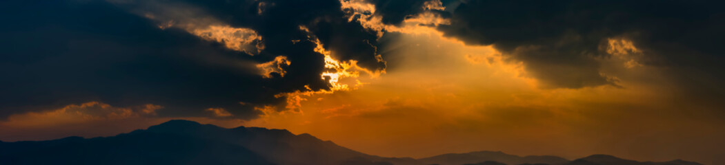 sun behide the cloud with sunset for background